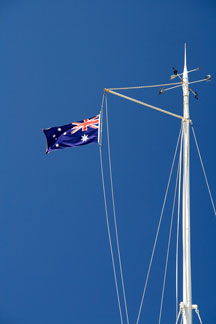 Australian flag flying from a ship's rigging